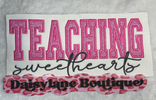 Embroidered patch with 'Teaching sweethearts' text and Daisylane Boutique branding on a white background.